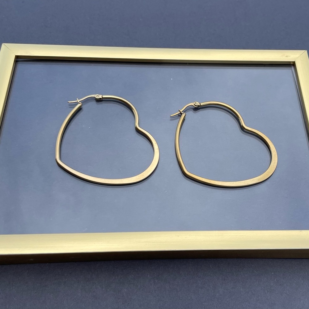 Gold heart shaped large hoop earrings